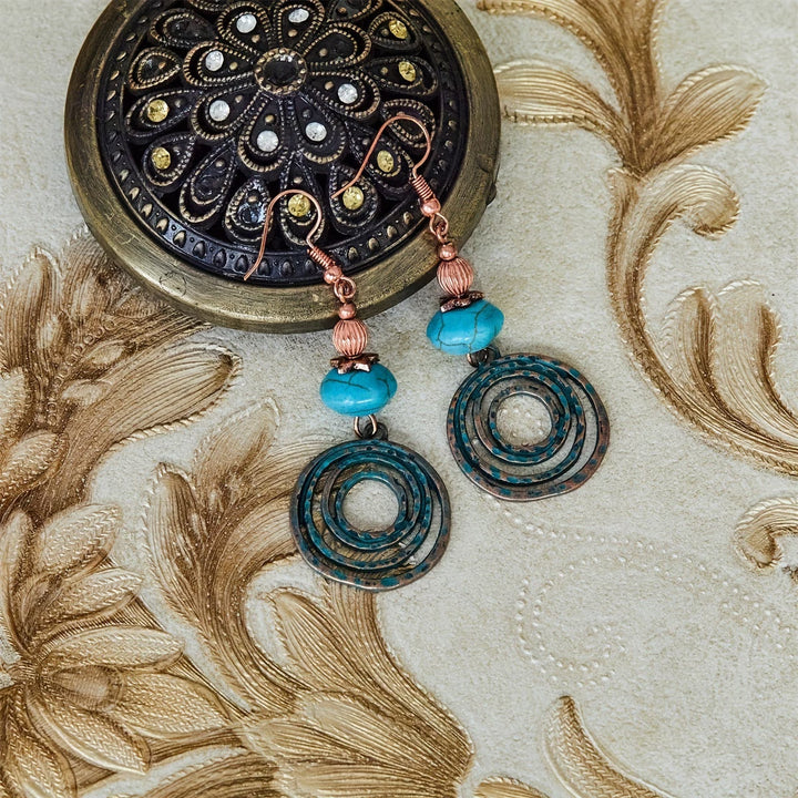 Ité — Copper Patina Circle Earrings