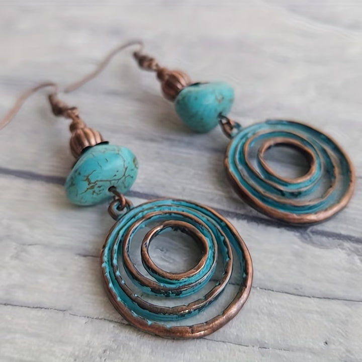 Ité — Copper Patina Circle Earrings