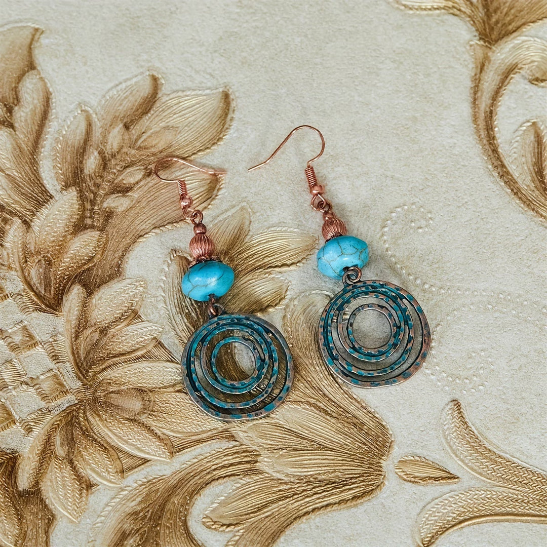 Ité — Copper Patina Circle Earrings